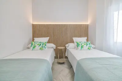 Cama o camas de una habitación en Apto Tendillas Centro Terraza - Oliva Suite