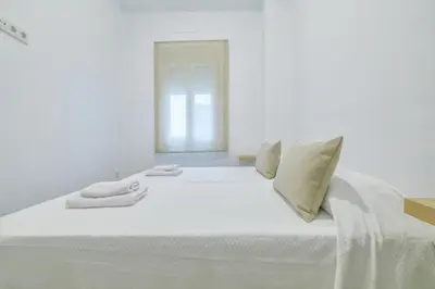 Cama o camas de una habitación en Apto Gran Capitán Center I - Parking