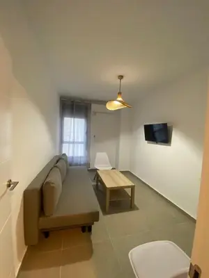 Una televisión o centro de entretenimiento en 9742 Apartamento Corte Inglés