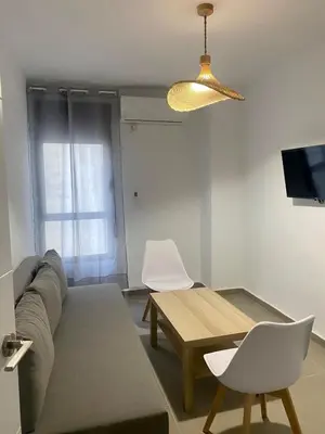 Una televisión o centro de entretenimiento en 9742 Apartamento Corte Inglés
