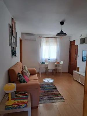 Zona de estar de Sol y Olivos Apartamento céntrico en zona de aparcamiento gratuito
