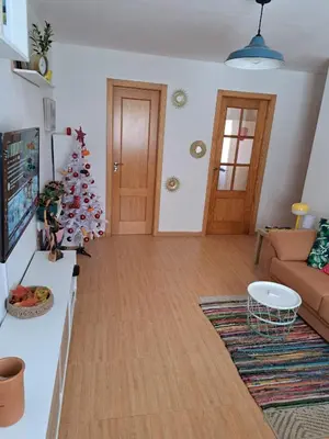 Una televisión o centro de entretenimiento en Sol y Olivos Apartamento céntrico en zona de aparcamiento gratuito