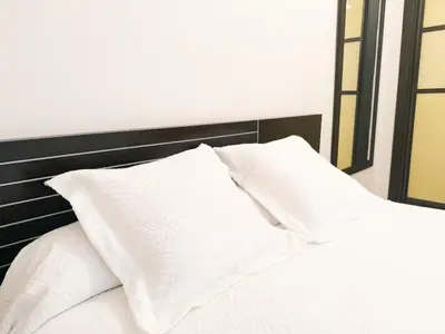 Cama o camas de una habitación en El balcón de la Luz