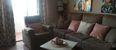 Zona de estar de Apartamento el Arcángel