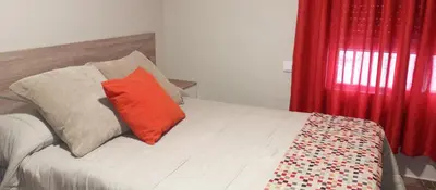 Cama o camas de una habitación en Apartamento el Arcángel