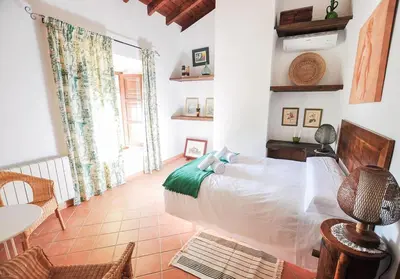 Cama o camas de una habitación en Cortijo Las Caballerias