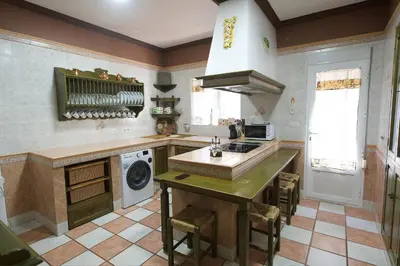 Una cocina o zona de cocina en Apartamento turísticos ilusiones 1