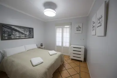 Cama o camas de una habitación en Apartamento turísticos ilusiones 1