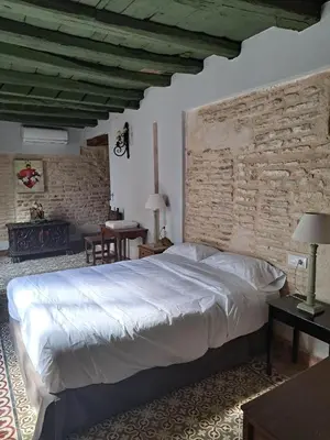 Cama o camas de una habitación en Hospedería Monasterio de San Leandro