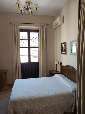 Cama o camas de una habitación en Posada del Potro Apartment