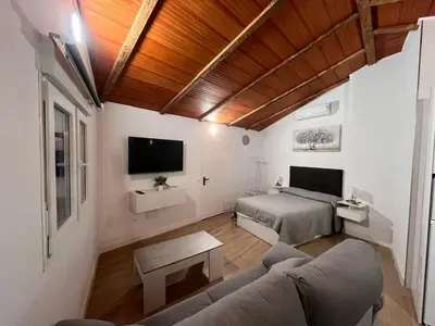 Una televisión o centro de entretenimiento en Apartamento Isabel