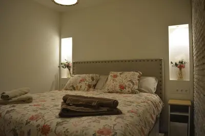 Cama o camas de una habitación en Casa Macarena Sunflower