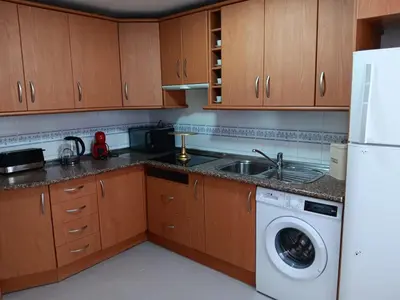 Una cocina o zona de cocina en Plaza Ayuntamiento 2 habitaciones B&A
