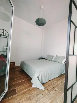 Cama o camas de una habitación en Suite Feria
