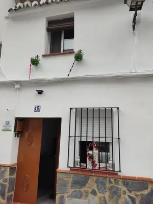 Edificio en el que se encuentra la habitación en casa particular