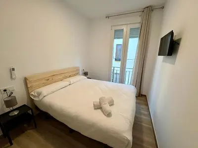 Una televisión o centro de entretenimiento en Ms22 Nuevo apartamento en centro