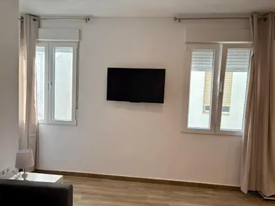 Una televisión o centro de entretenimiento en Ms23 Apartamento nuevo en centro