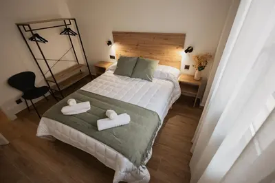 Cama o camas de una habitación en Mar de Olivos Baeza