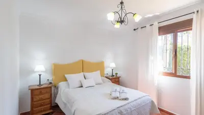 Cama o camas de una habitación en Cortijo El Púlpito Periana by Ruralidays