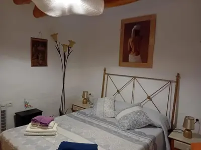 Cama o camas de una habitación en Villa Poemas