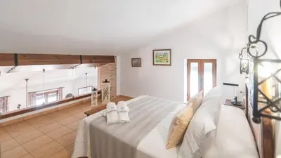 Cama o camas de una habitación en Cortijo Casablanca Villanueva de la Concepción by Ruralidays