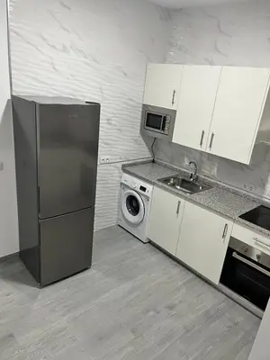 Una cocina o zona de cocina en Apartamento El Rincón del Olivar 1