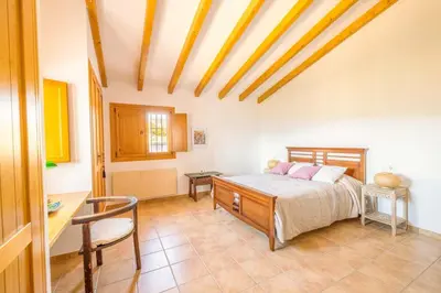 Cama o camas de una habitación en Casa Gino by Rosas Cantares
