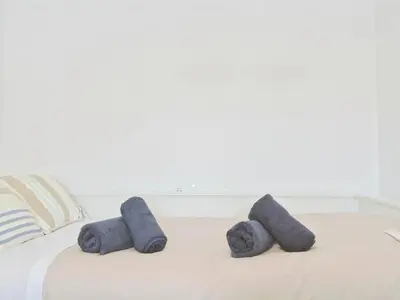 Cama o camas de una habitación en BHost - Los Patos