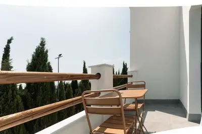 Un balcón o terraza de Villa sunset piscina privada