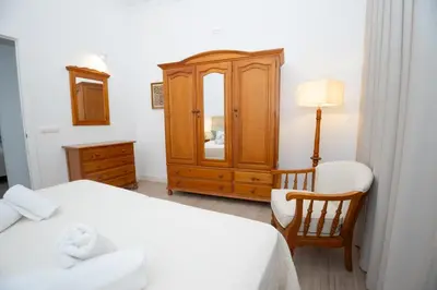 Cama o camas de una habitación en El Templete Suite 1