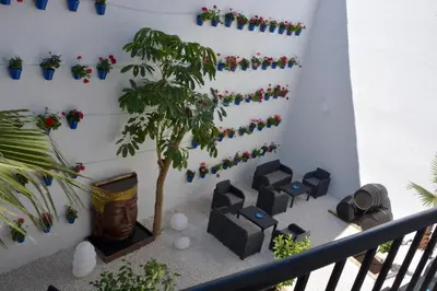 Un balcón o terraza de CASA PATIO LAS PALMERAs 1 Y 2