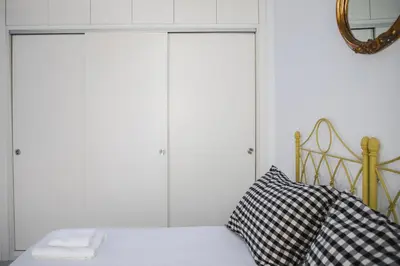 Cama o camas de una habitación en FAM Sevillian Apartment
