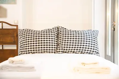 Cama o camas de una habitación en FAM Sevillian Apartment