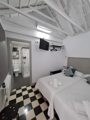 Cama o camas de una habitación en Plaza de España