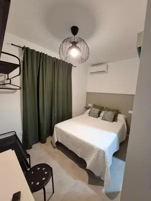 Cama o camas de una habitación en Plaza de España