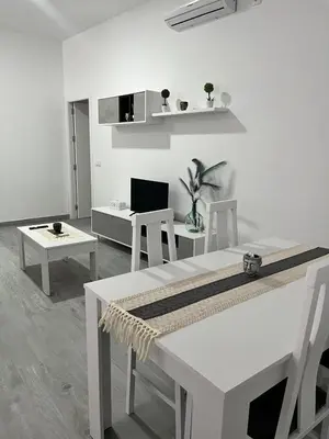 Una televisión o centro de entretenimiento en Apartamento Rincón del Olivar II