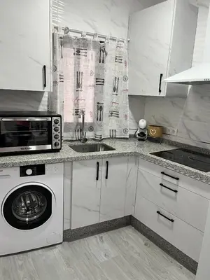 Una cocina o zona de cocina en Apartamento Rincón del Olivar II