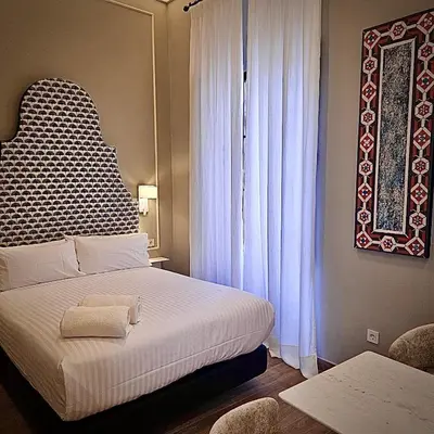 Cama o camas de una habitación en Puerta de la Ribera Centro