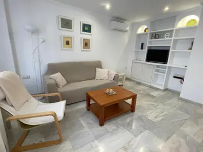 Una televisión o centro de entretenimiento en Apartamento CAMINO MOZÁRABE