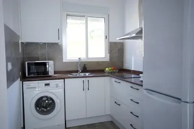 Una cocina o zona de cocina en Villas Privadas EL DESCANSO