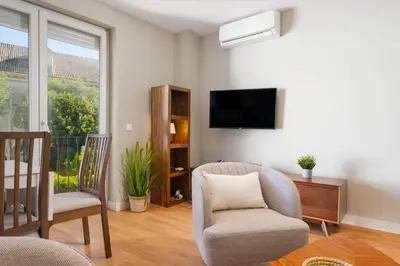 Una televisión o centro de entretenimiento en Apartment with views -Santa Isabel Square- 2Bd1Bth