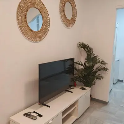 Una televisión o centro de entretenimiento en Azafran Loft