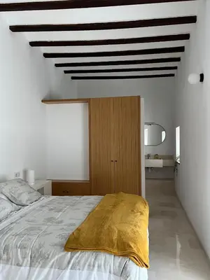 Cama o camas de una habitación en Casa con jardín y piscina en Córdoba