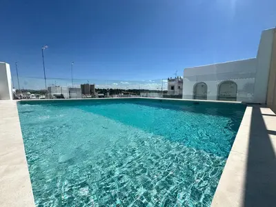 Piscina en o cerca de Villa con piscina privada salada, solárium y 3 dormitorios