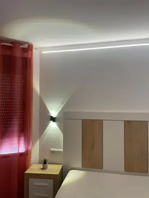 Cama o camas de una habitación en Alojamientos Carola Palma del Río, 6