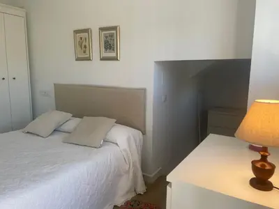 Cama o camas de una habitación en Mirador al puente del río Genil