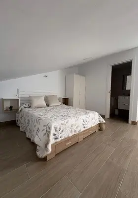 Cama o camas de una habitación en Apartamentos Élan