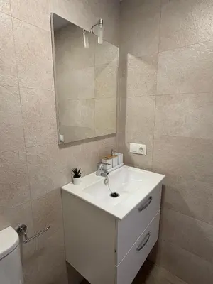 Un baño de Apartamentos Élan