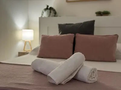 Cama o camas de una habitación en Loyola Premium Córdoba Centro
