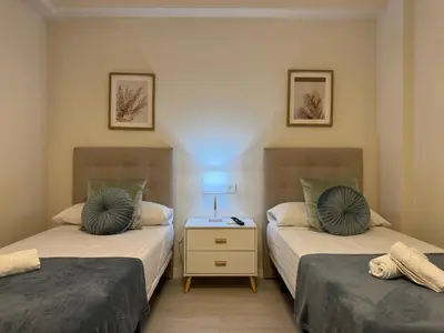 Cama o camas de una habitación en Loyola Premium Córdoba Centro